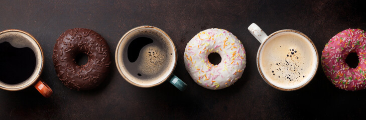 Canvas Print - Coffee cups and colorful donuts