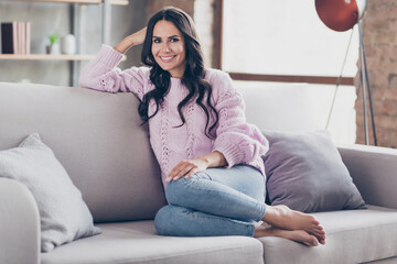 Canvas Print - Full length photo of charming lovely attractive young woman sit sofa hold hand head good mood indoors inside apartment