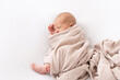 newborn baby sleeping indiaper