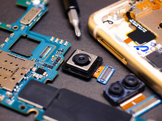 phone repair, disassembled phone, phone board, phone parts, close up