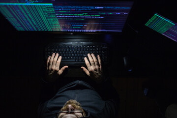 Wall Mural - hacker coding at night cybersecurity concept