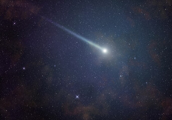 Shining comet in a starry night sky.