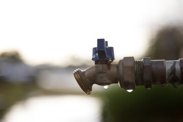 Wall Mural - Closeup shot of an old faucet