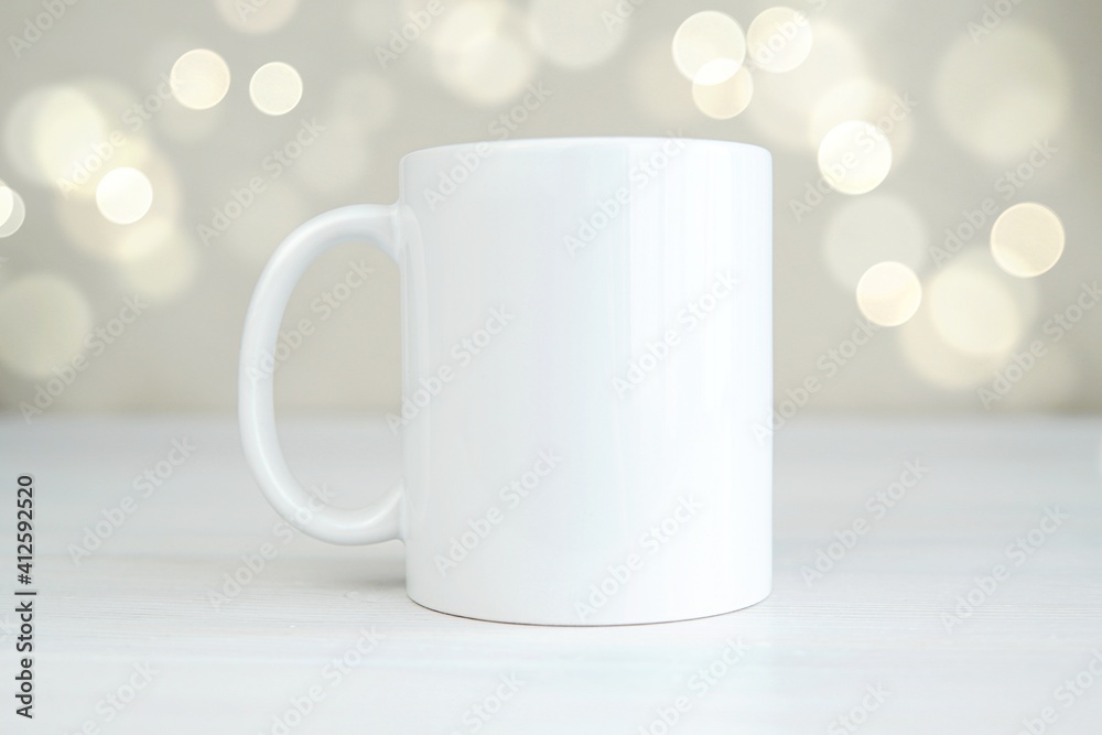 White blank coffee mug mockup for design presentation, festive silver  background. Stock Photo | Adobe Stock