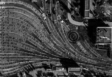 Aerial Drone Creative Top View To Metro Depot Heavy Rail, Subway, Tube, Metropolitana Or Underground. Black And White Square Design Composition. Abstract Representation Of Public Transport Industry 
