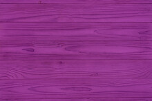 A Wall Made Of Purple Wood Planks.