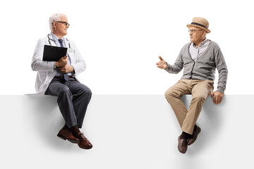 Poster - Mature doctor sitting on a blank panel and talking with an elderly man