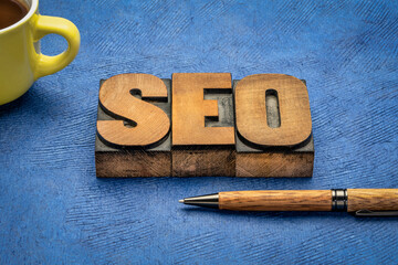 Canvas Print - search engine optimization (seo) - acronym in vintage letterpress wood type printing with a pen and 