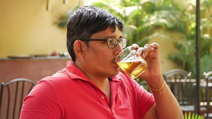 Wall Mural - Close shot of man drinking wine, Man wearing glasses drinking wine