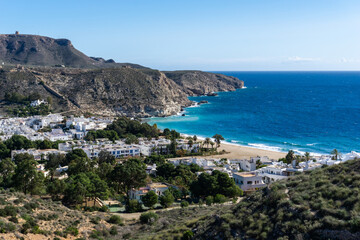 Sticker - view of the idyllic whitewashed fishing village of Agua Amarga on the coast of Andalusia