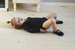 © Rodica - Funny little ballerina toddler does exercises at home. Little girl dreams of becoming a ballerina. Preparations for ballet or dance lessons. Hobbies for girl