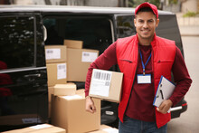 Courier With Clipboard And Parcel Near Delivery Van Outdoors. Space For Text