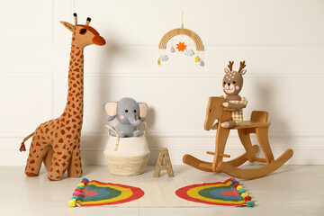 Wall Mural - Composition with cute toys and children's room interior elements indoors