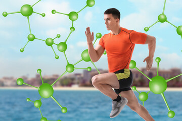 Canvas Print - Metabolism concept. Molecular chain illustration and athletic young man running  near sea on sunny day