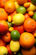 © New Africa - Different ripe citrus fruits as background, closeup