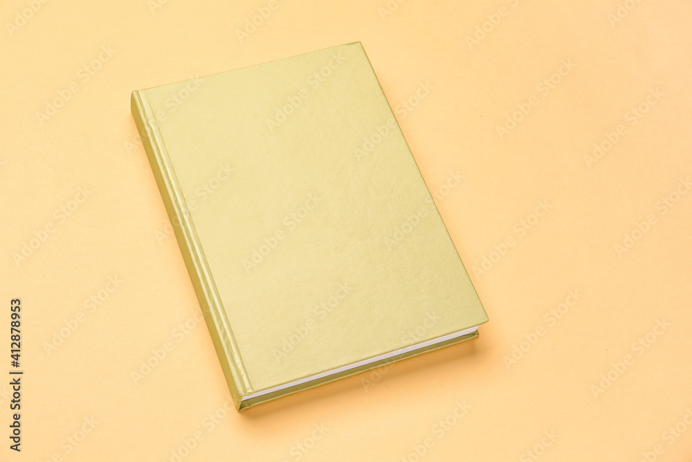 Blank book on color background