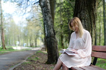 young girl in a dress in the park