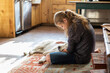 © Mint Images - Teenage girl stroking her English Cream Golden Retriever dog