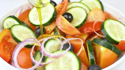 Wall Mural - Mix fresh salad with red tomatoes, cucumber, onion and black olives