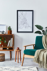 Stylish interior of living room with design wooden shelf, velvet sofa,  plants, mock up poster map, vinyl recorder, book, cacti and personal accessories in retro home decor. Template.