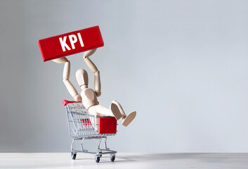 Poster - wooden man hold a red wooden block with word kpi ,concept