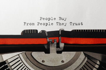 Poster - Text People Buy From People They Trust typed on retro typewriter