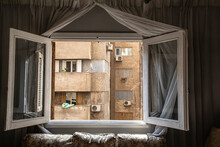 Africa, Egypt, Cairo. View Of An Apartment Building And Balconies Through An Open Window.