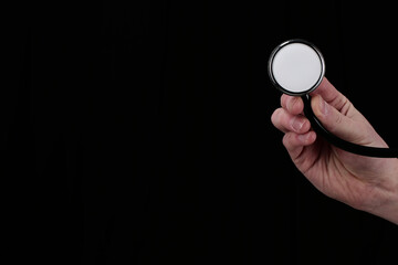 Female hand with stethoscope, with room for text. isolated on a white background