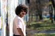 © Jale Ibrak - Attractive Man Posing at Graffiti Wall Outside