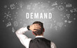 © ra2 studio - Rear view of a businessman with DEMAND inscription, modern business concept