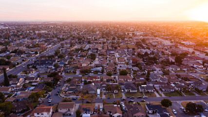 Wall Mural - Sunset aerial view of a neighborhood in Downey, California, USA.