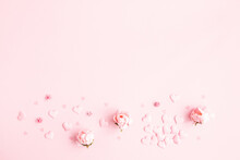 Valentine's Day Background. Frame Made Of Pink Flowers, Hearts On Pastel Pink Background. Valentines Day Concept. Flat Lay, Top View, Copy Space