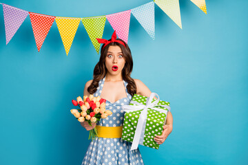 Sticker - Portrait of her she nice attractive glamorous amazed stunned wavy-haired girl holding in hands unexpected giftbox tulips isolated on bright vivid shine vibrant blue color background