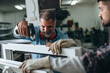 © cherryandbees - pvc workers making window frame
