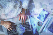 © peshkova - Multi exposure of woman hands working on computer and forex chart hologram drawing. Top View. Financial analysis concept.