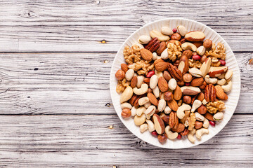 Wall Mural - Various nuts on a plate