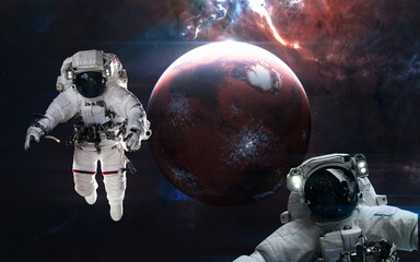 Wall Mural - mars. astronauts in front of the inhabited red planet. solar system. 3d render. science fiction. ele
