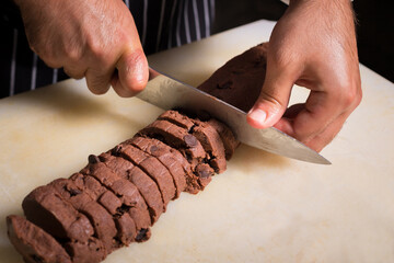 Chef preparing cookies in his kitchen.