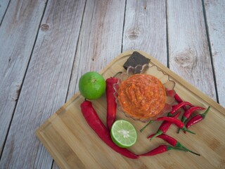 Wall Mural - Shrimp paste sambal or better known as sambal belacan. a famous traditional dips in Malaysia. Selective focus points. Blurred background