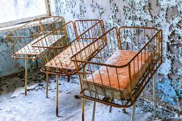 Poster - Ukraine, Pripyat, Chernobyl. The Hospital MsCh-126 (medical-sanitary unit). Infant beds in maternity area.