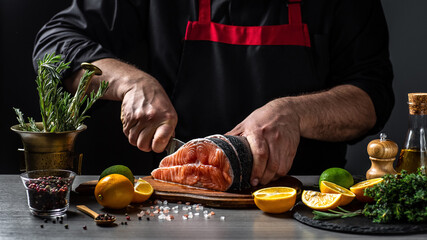 Wall Mural - Fresh salmon with dill. chef cuts with knife the salmon. Salmon steak raw fish and ingredients prepared for cooking. concept for eating and healthy