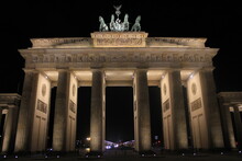 Low Angle View Of Illuminated Brandenburg Gate At Night