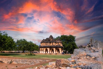 Wall Mural - Ancient ruins of  Beautiful carved stone arch of Lotus Mahal Temple in Royal Center of Hampi. Karnataka, India