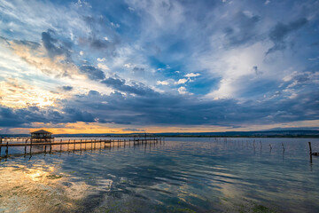 Wall Mural - Stunning long exposure landscape on a seashore after sunset.