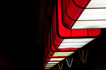 red modern light in subway station