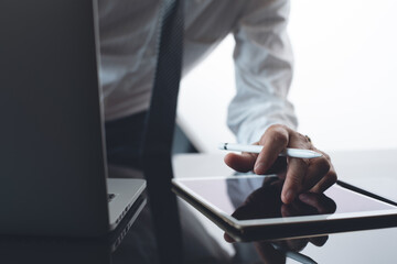 Poster - Businessman, corporate man using digital tablet and laptop computer, busy working in modern office