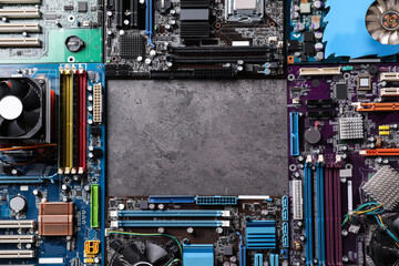 Poster - Frame of computer motherboards on grey table, flat lay with space for text. Electronic device