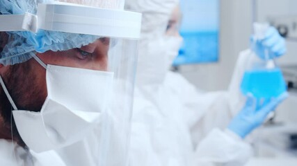 Wall Mural - professional team of scientists is working on a vaccine in a modern scientific research laboratory. 