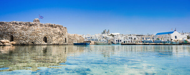 Wall Mural - Paros island, Naoussa, Cyclades, Greece, beautiful greek fishing village panoramic view. Travel, tourist destination, vacations concept	