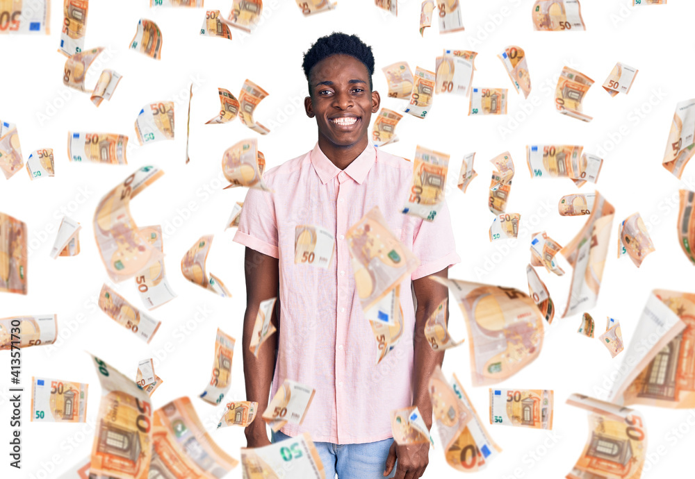Young african american man wearing casual clothes winking looking at the camera with sexy expression, cheerful and happy face.